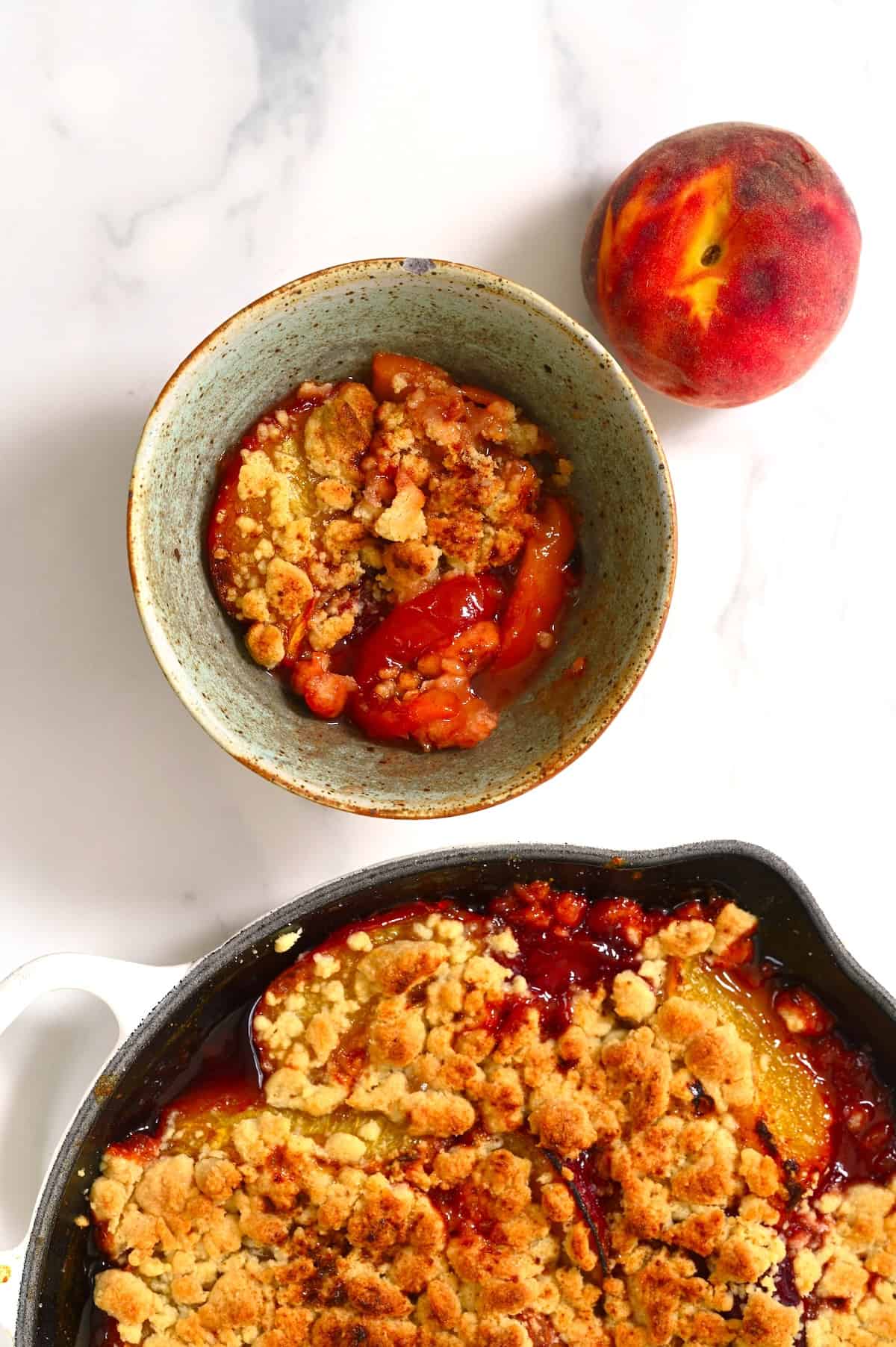 A serving of peach crumble