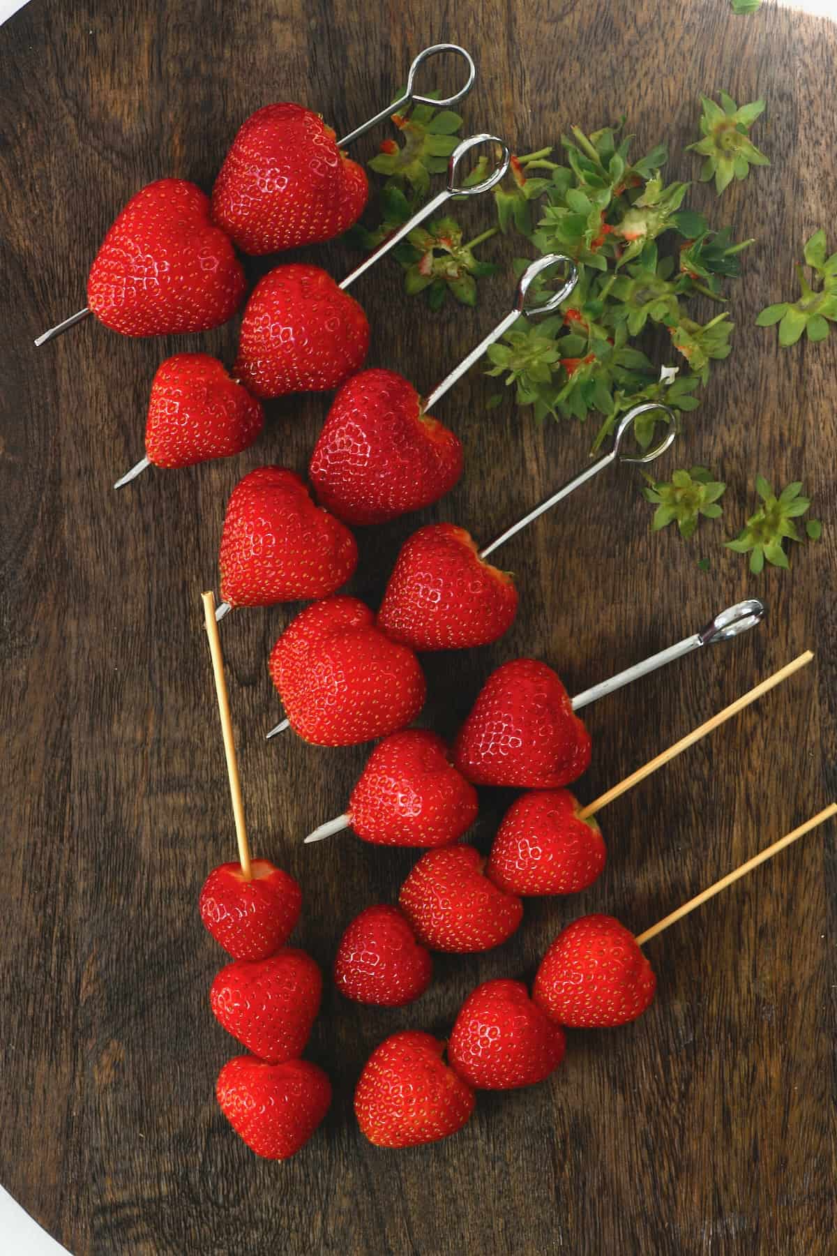 Strawberries arranged on skewers