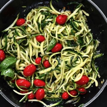 Zooddle pasta with cherry tomatoes in a pan