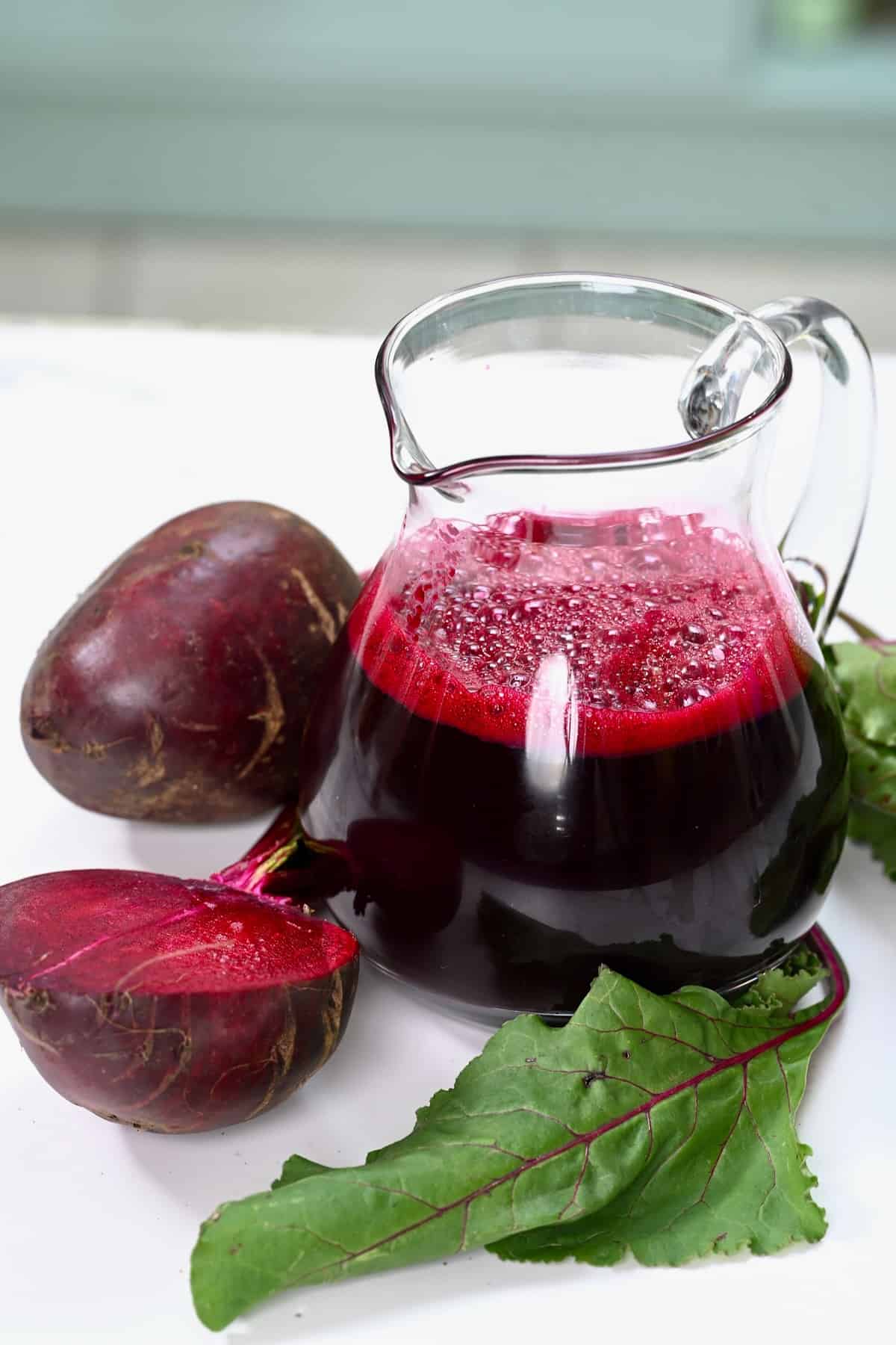 A small jug with beet juice