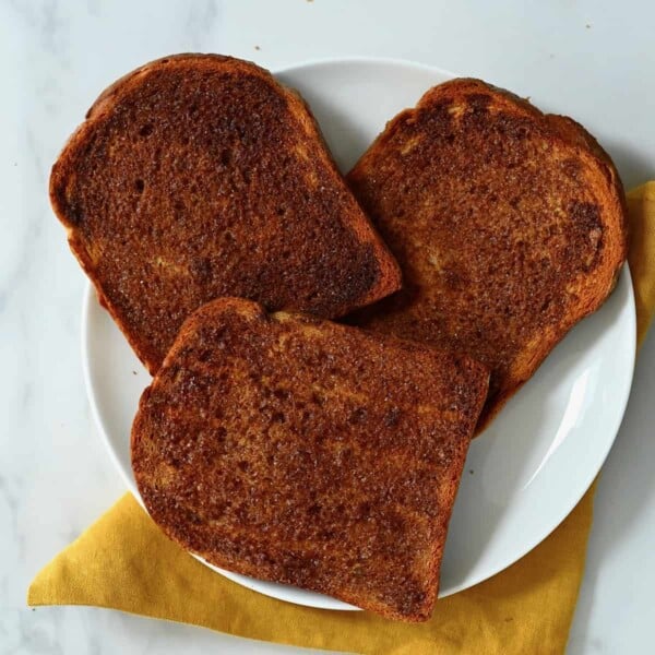Three slices of toast on a plate