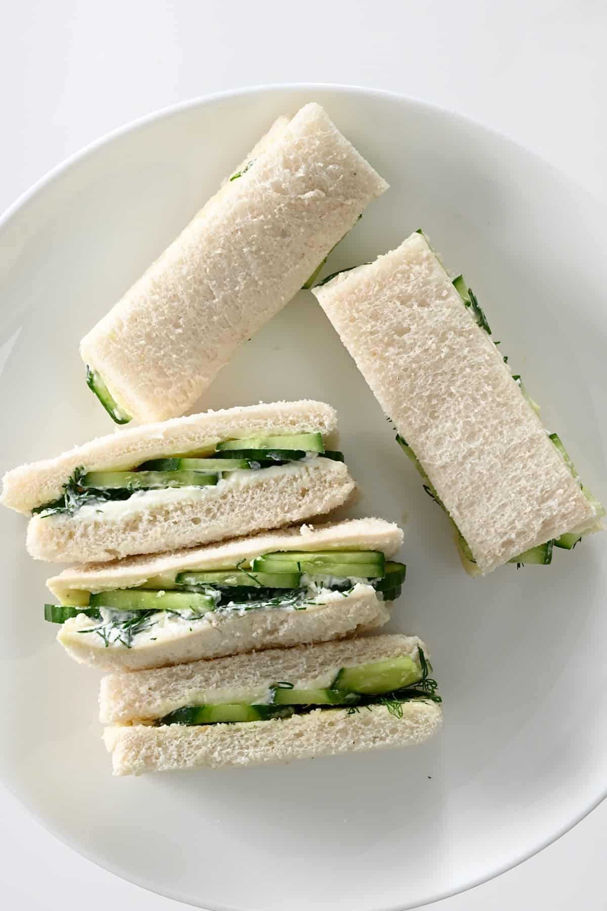Finger cucumber sandwiches on a plate