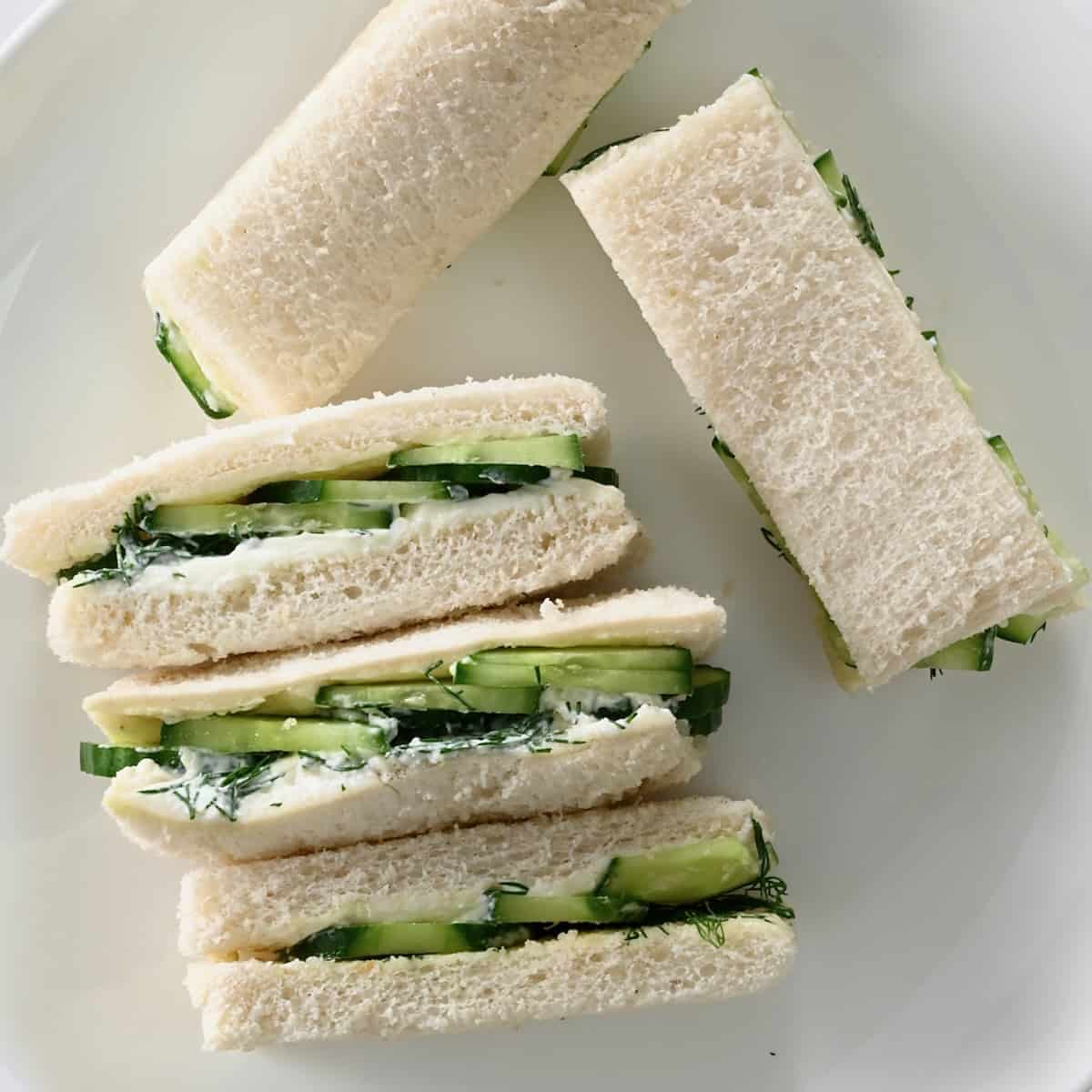 Finger cucumber sandwiches on a plate