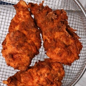 Three pieces of fried chicken