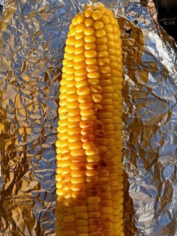 Grilling corn in the cob in foil