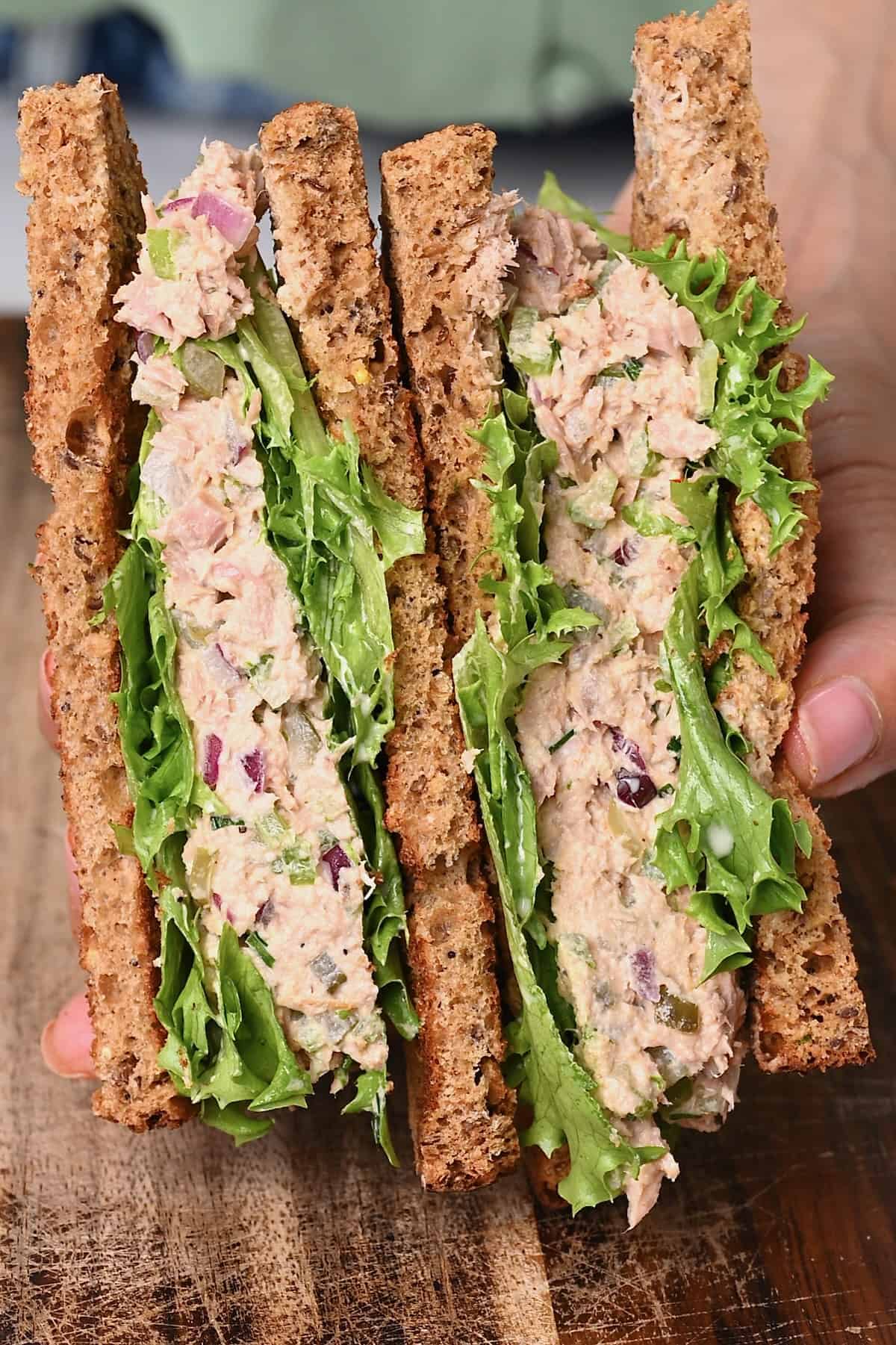 Two halves of tuna salad sandwich