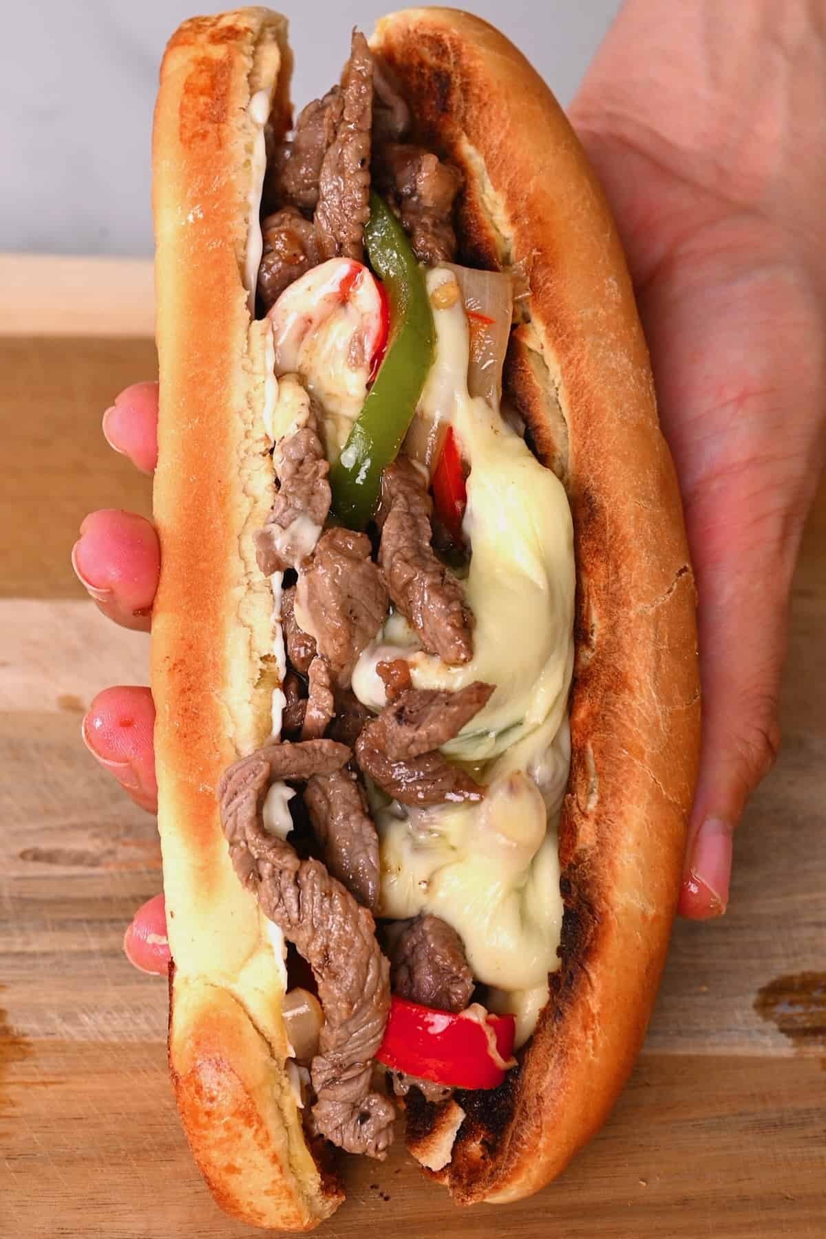 Philly cheesesteak sandwich with melted cheese