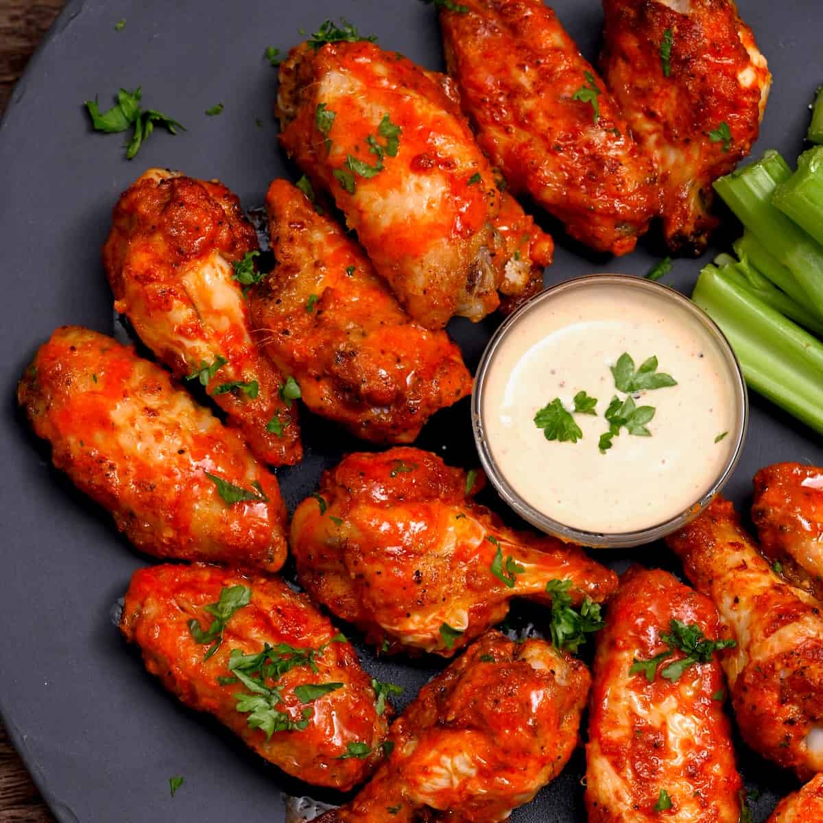 Chicken wings with buffalo sauce and Alabama sauce