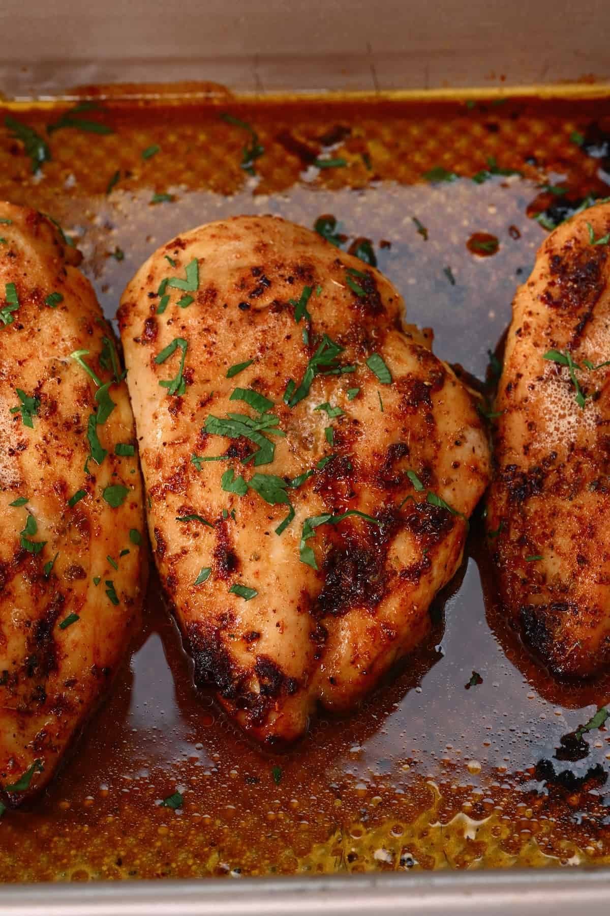 Baked chicken breast in an oven tray