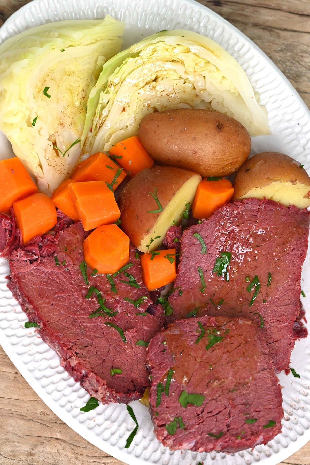 Corned beef cabbage carrots and potatoes on a plate
