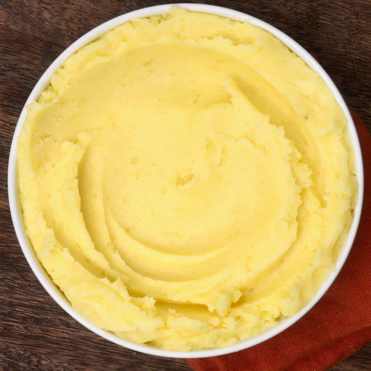 Homemade creamy mashed potatoes in a small bowl