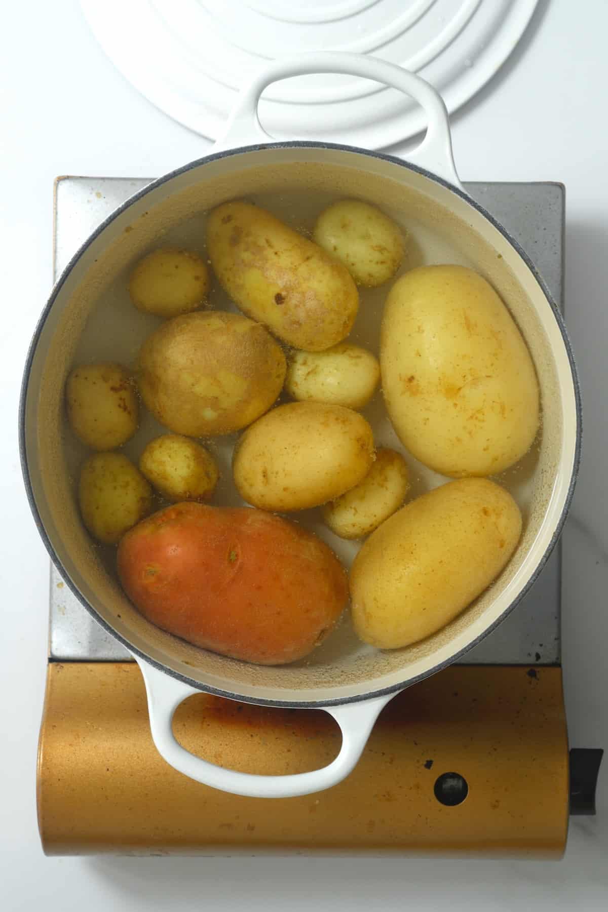 Boiling potatoes in a pot