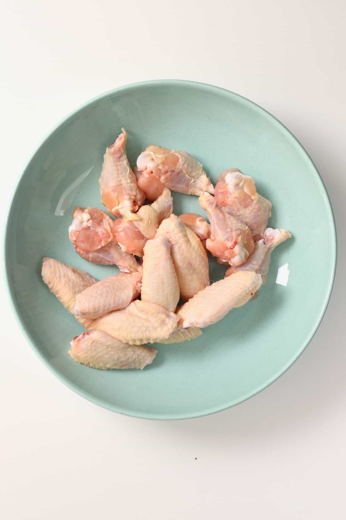 Chicken drummets and wingettes in a bowl