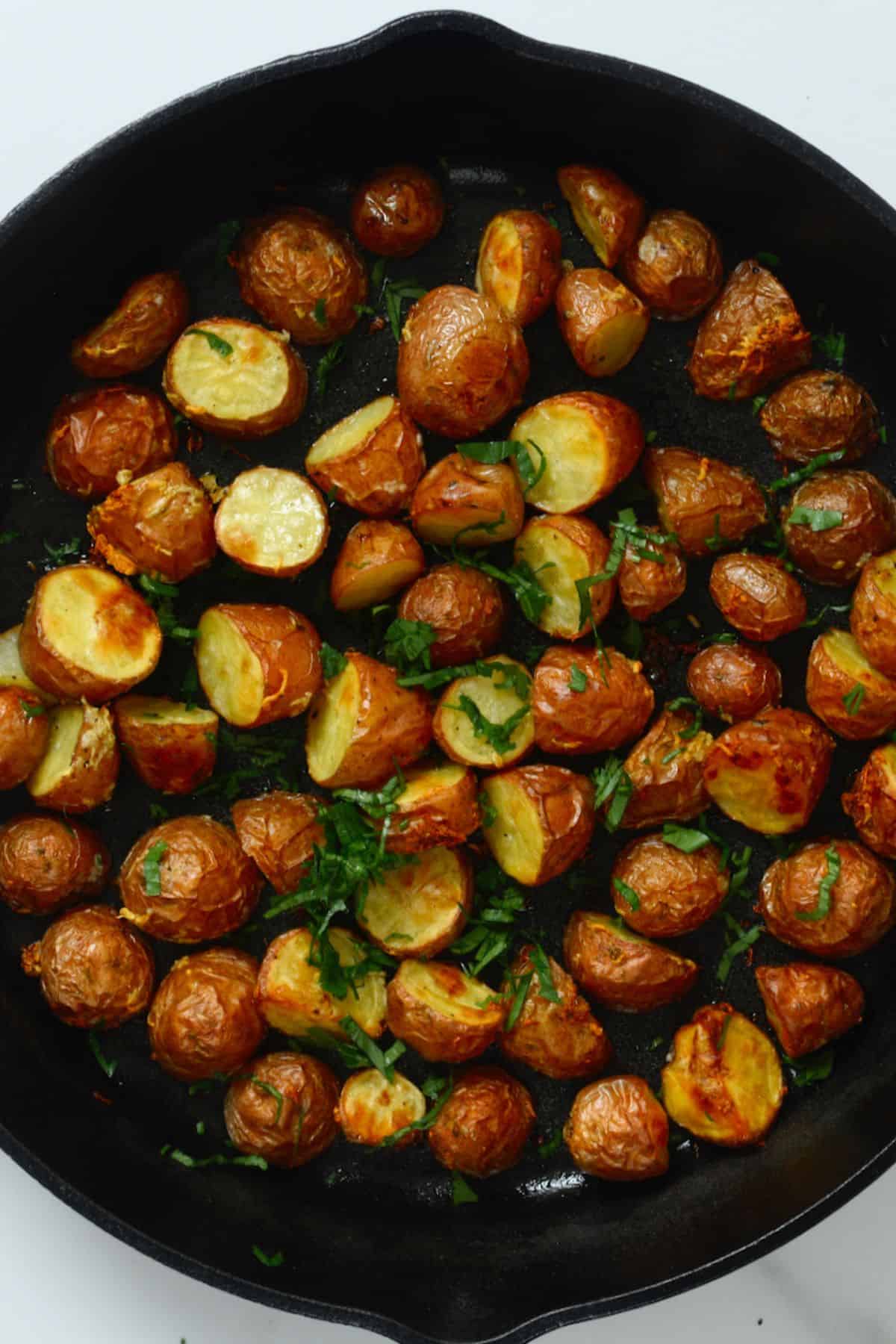 Roasted new potatoes in a pan