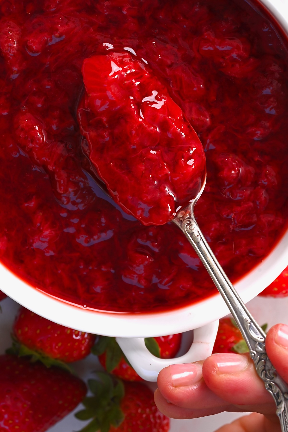 A spoonful of strawberry sauce