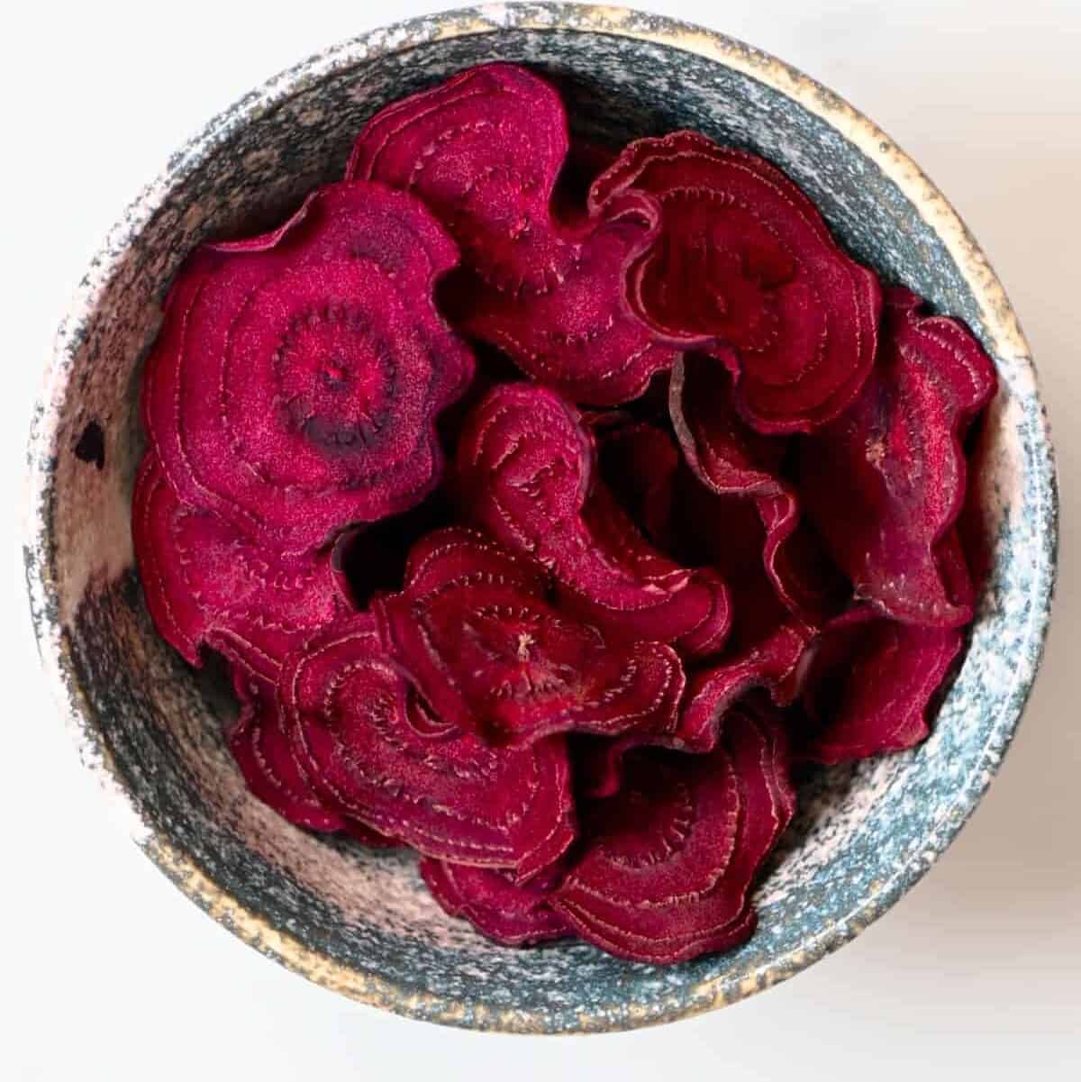 Homemade beetroot chips in a bowl