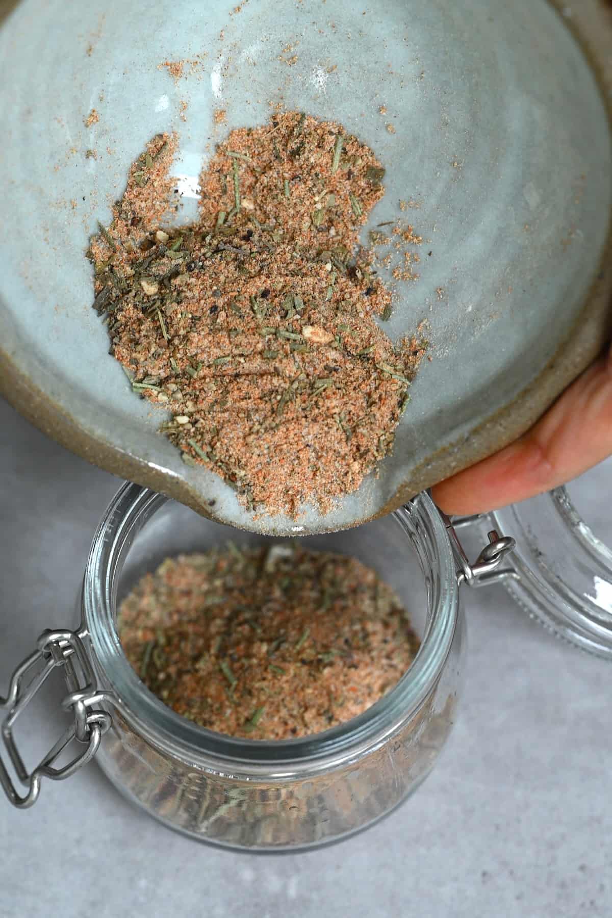 Transfering chicken dry rub into a jar