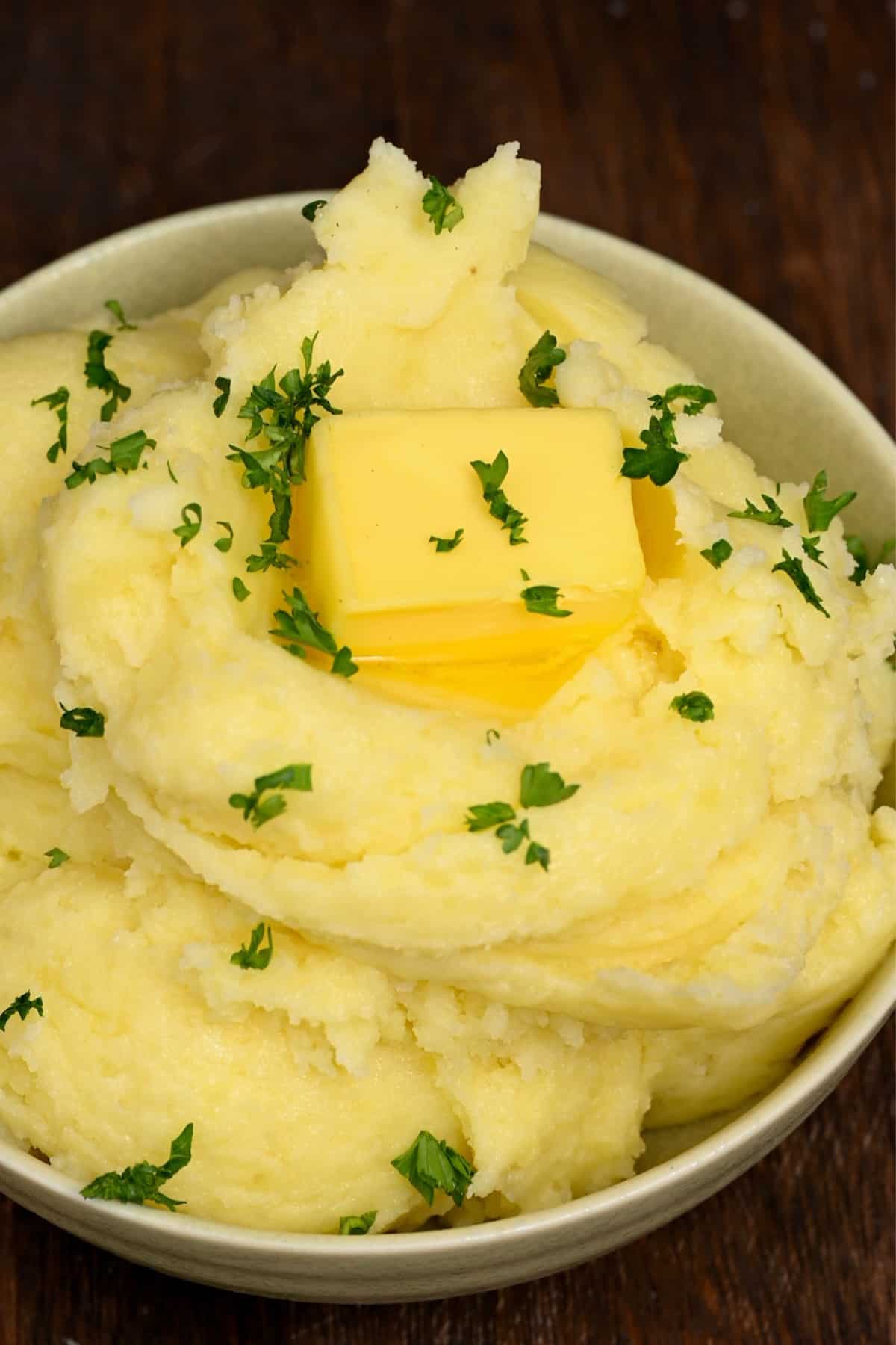 A bowl with fluffy mashed potatoes