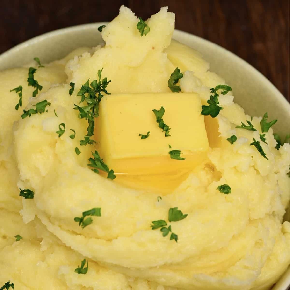 A bowl with fluffy mashed potatoes