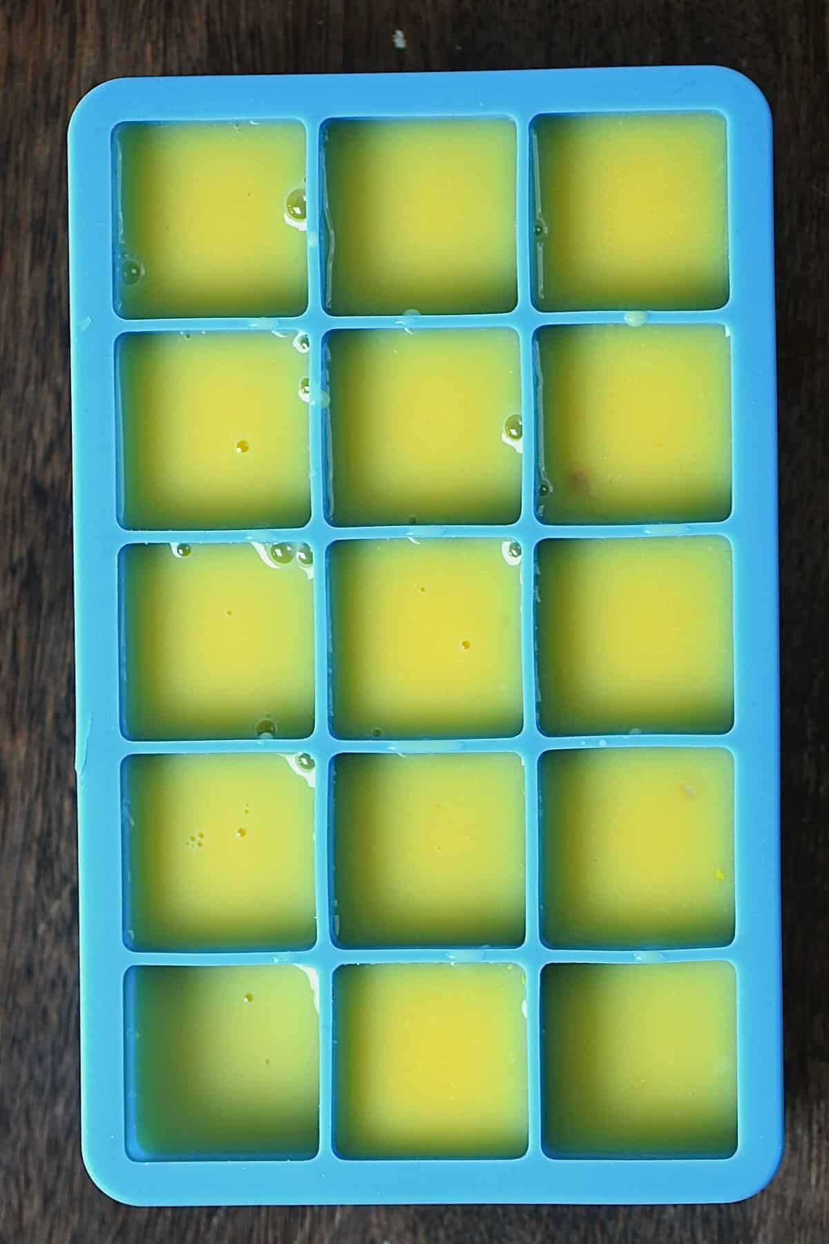 Freezeing ginger shots in an ice cube tray