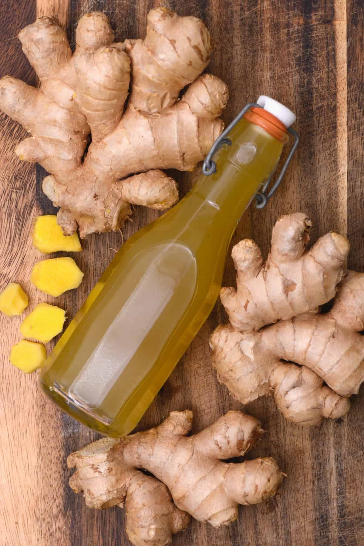 Homemade ginger syrup and ginger root