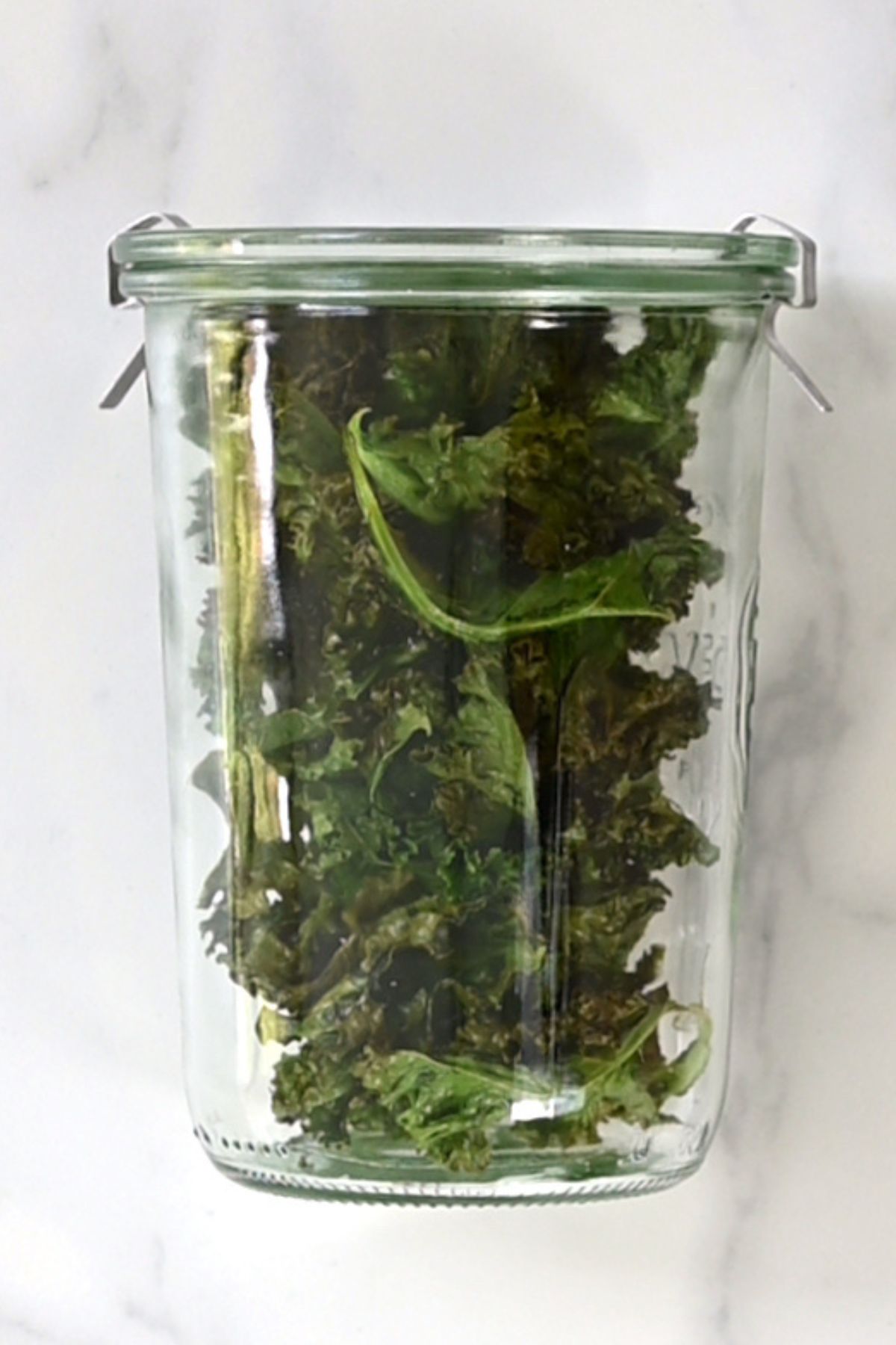 A jar with homemade kale chips