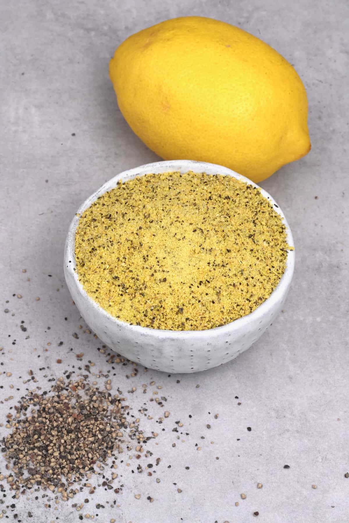 A small bowl with homemade lemon pepper seasoning