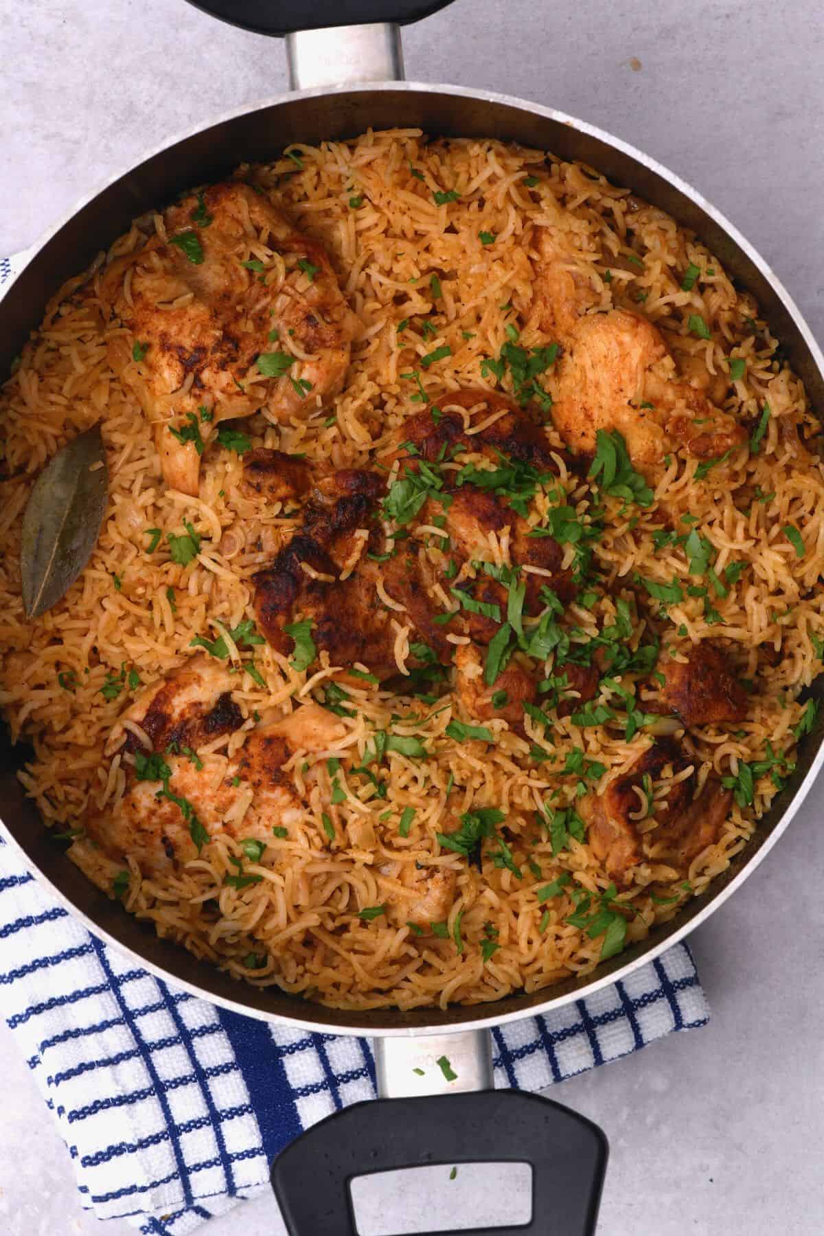 One pot chicken and rice on a flat surface