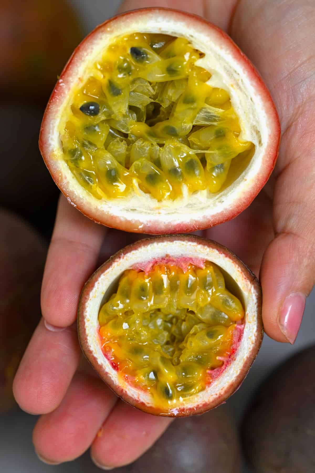 One passion fruit cut in two