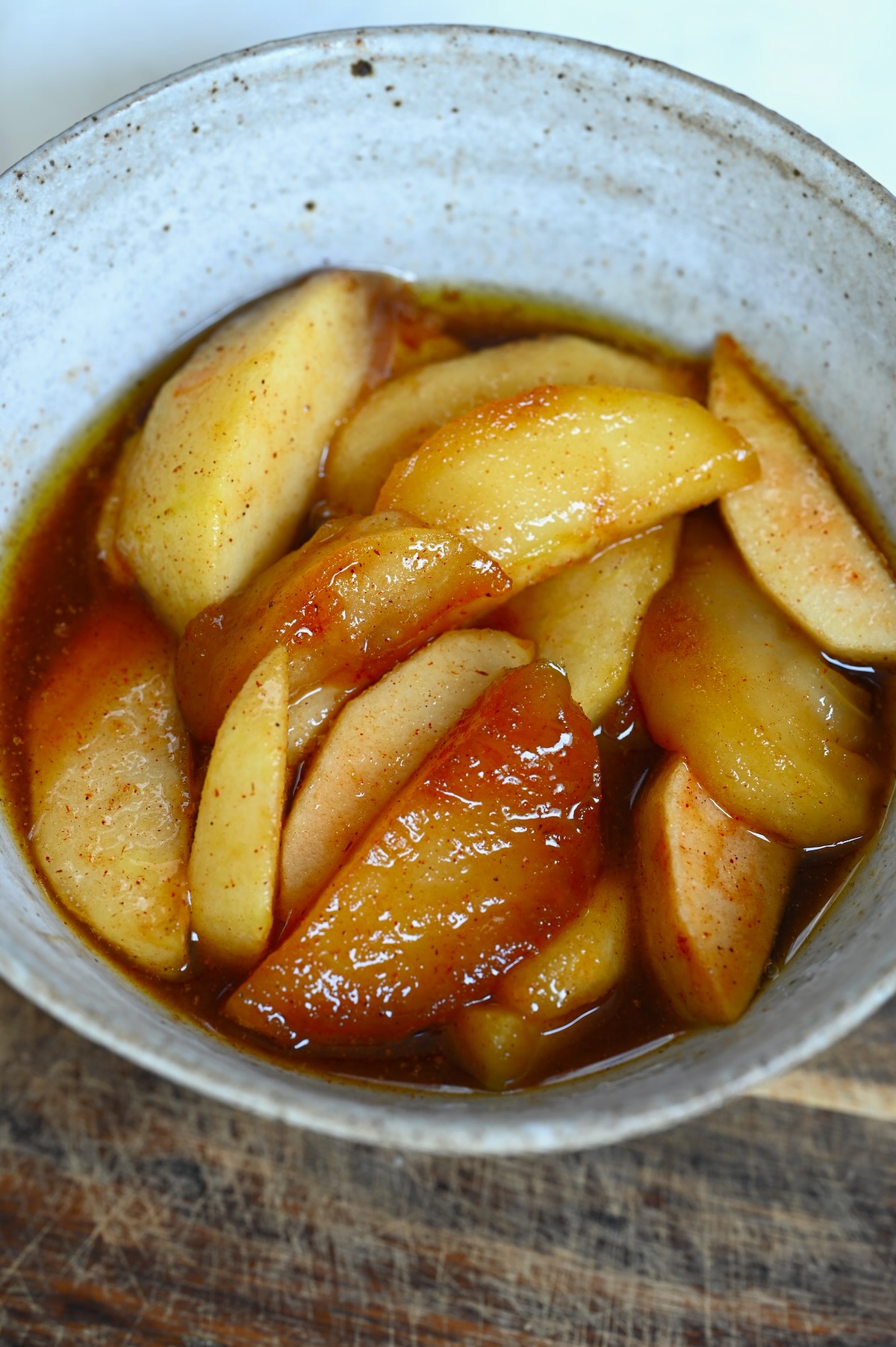 A serving of fried apples in a bowl
