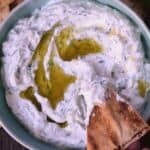 Homemade tzatziki in a bowl with pita chips - 18