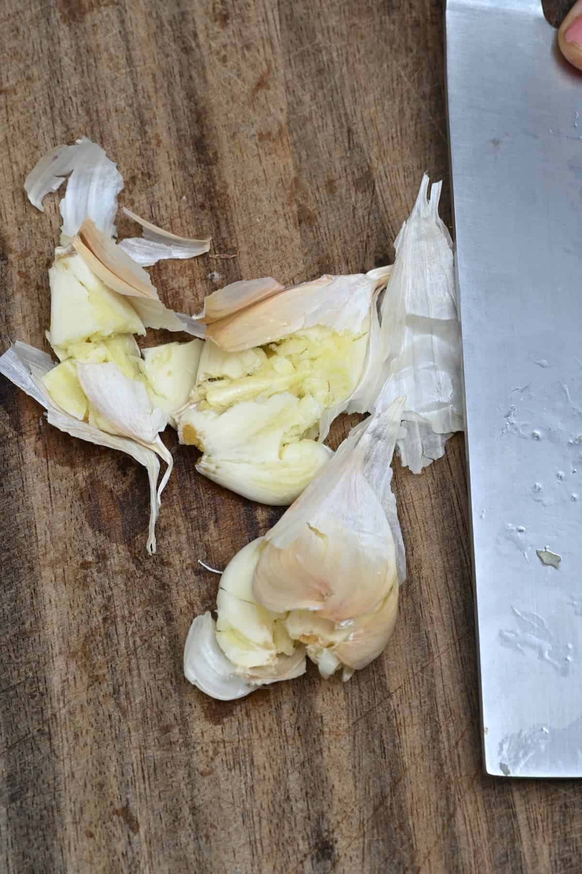 Crushing garlic with a knife