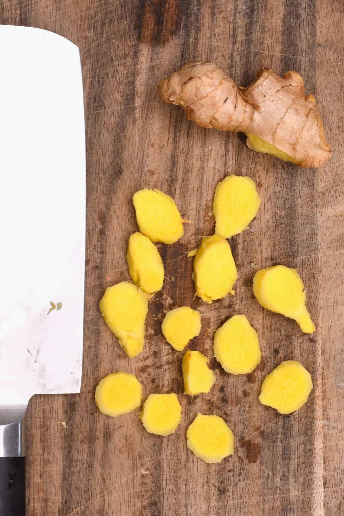 Ginger slices on a chopping board