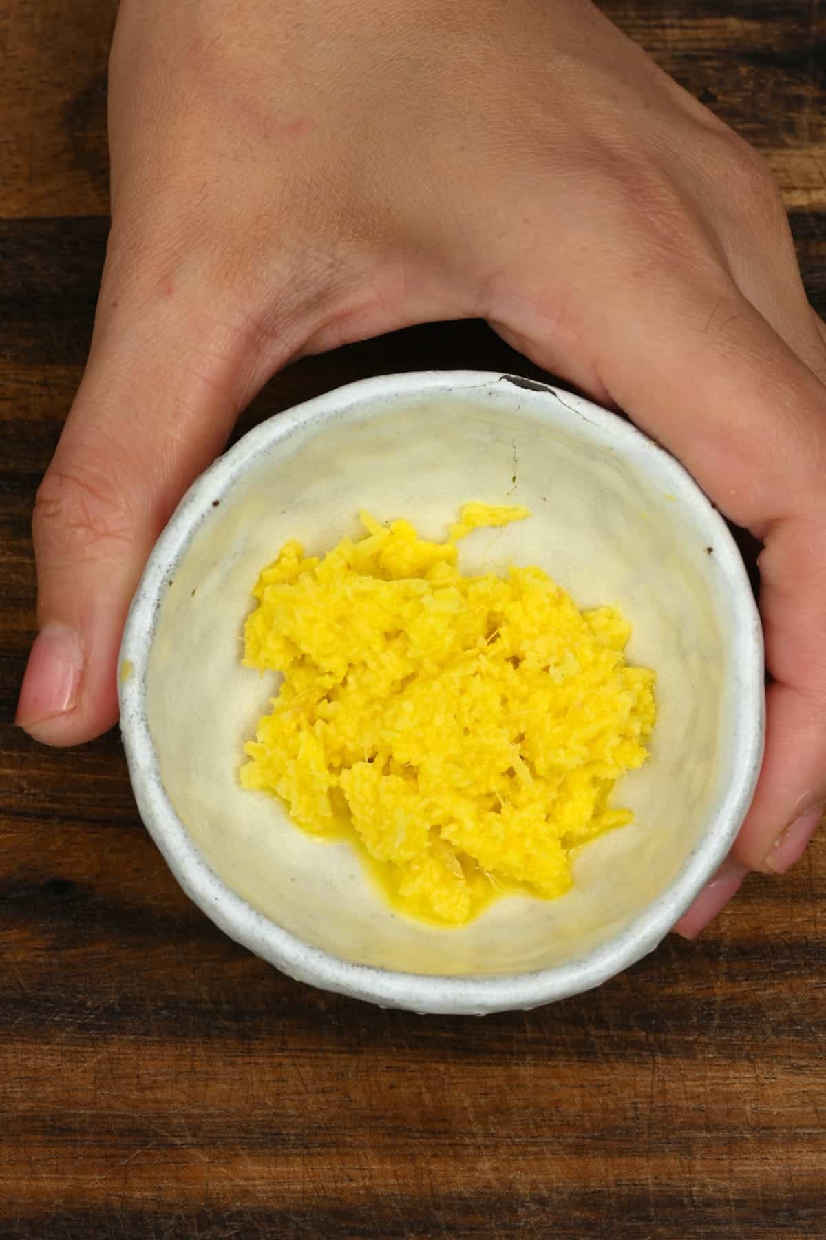 Minced ginger in a small bowl