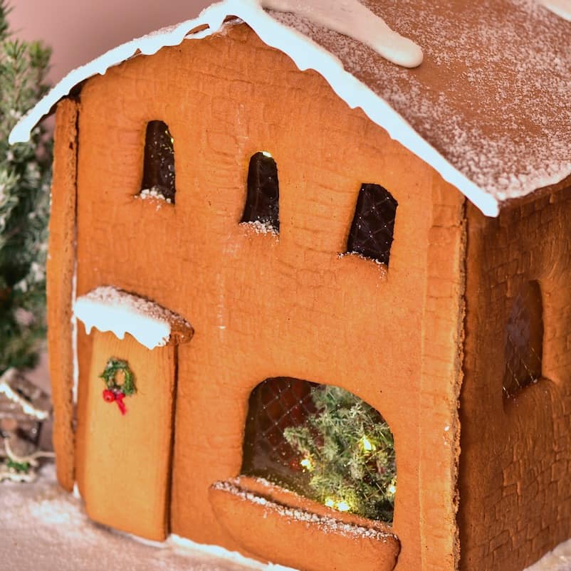 Homemade ginger bread house with snow