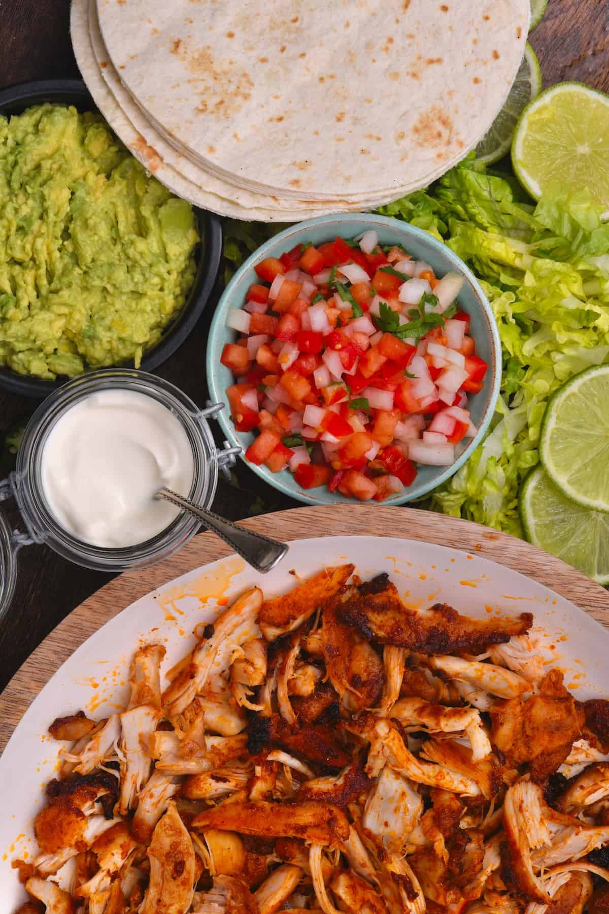 Shredded chicken thighs served with tacos