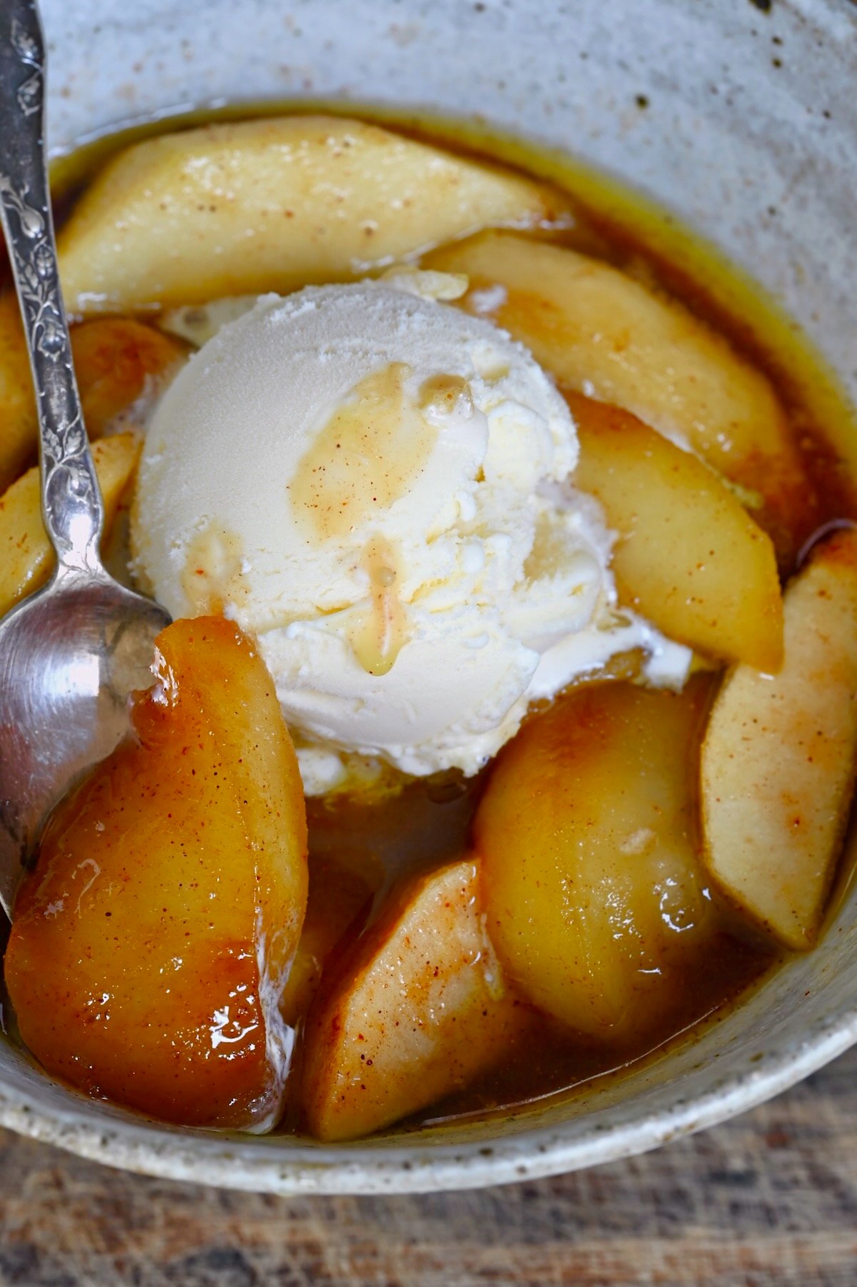 Fried apples topped with ice cream