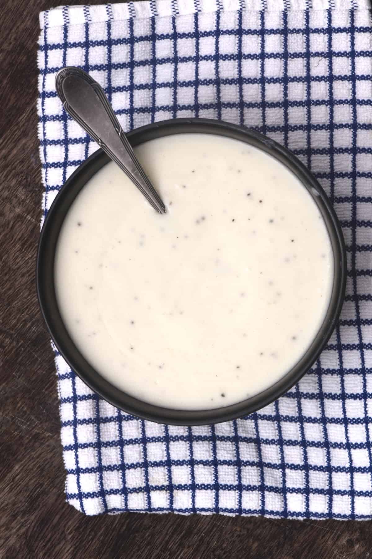 A bowl with homemade white gravy