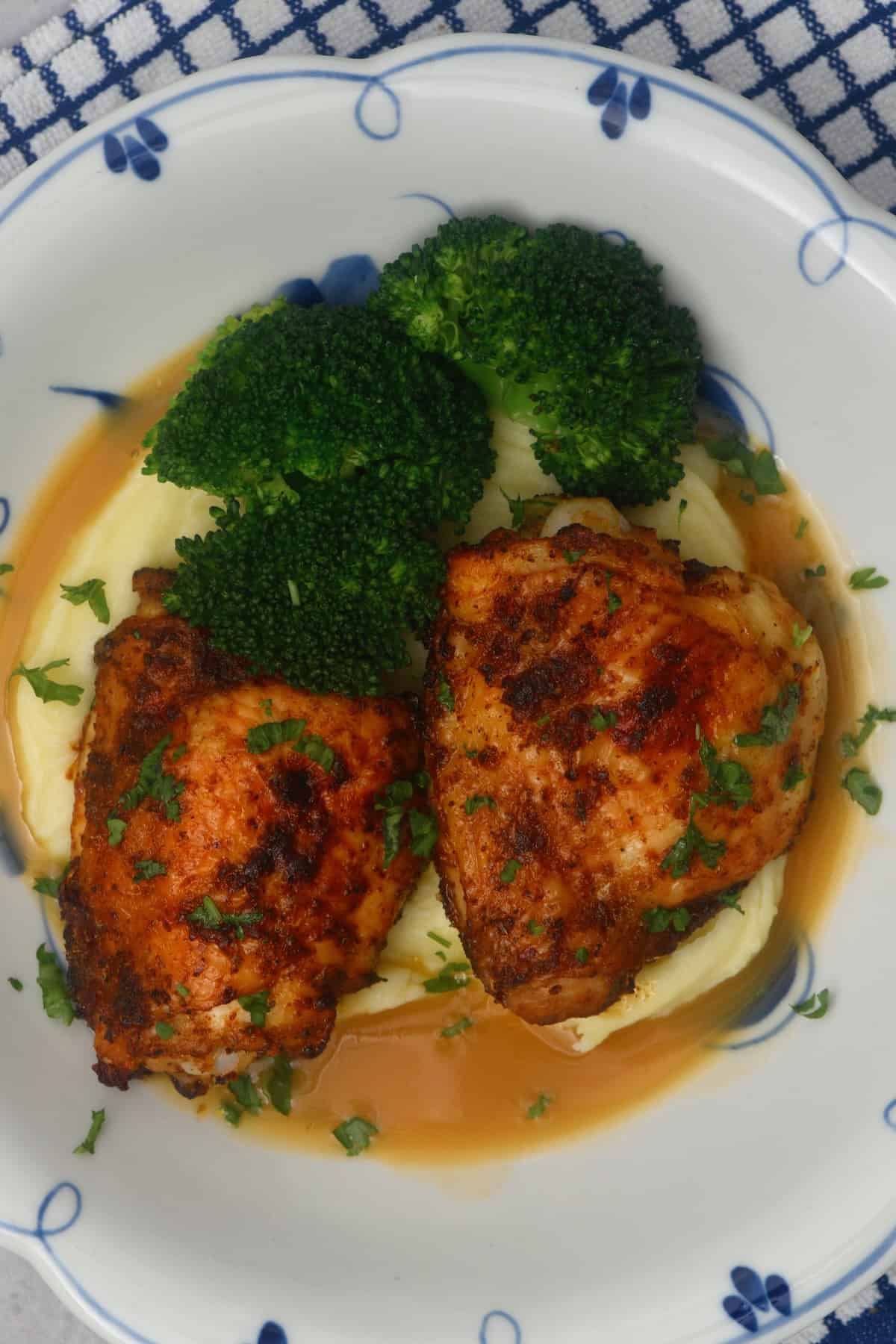 Chicken thighs with broccoli and mashed potatoes