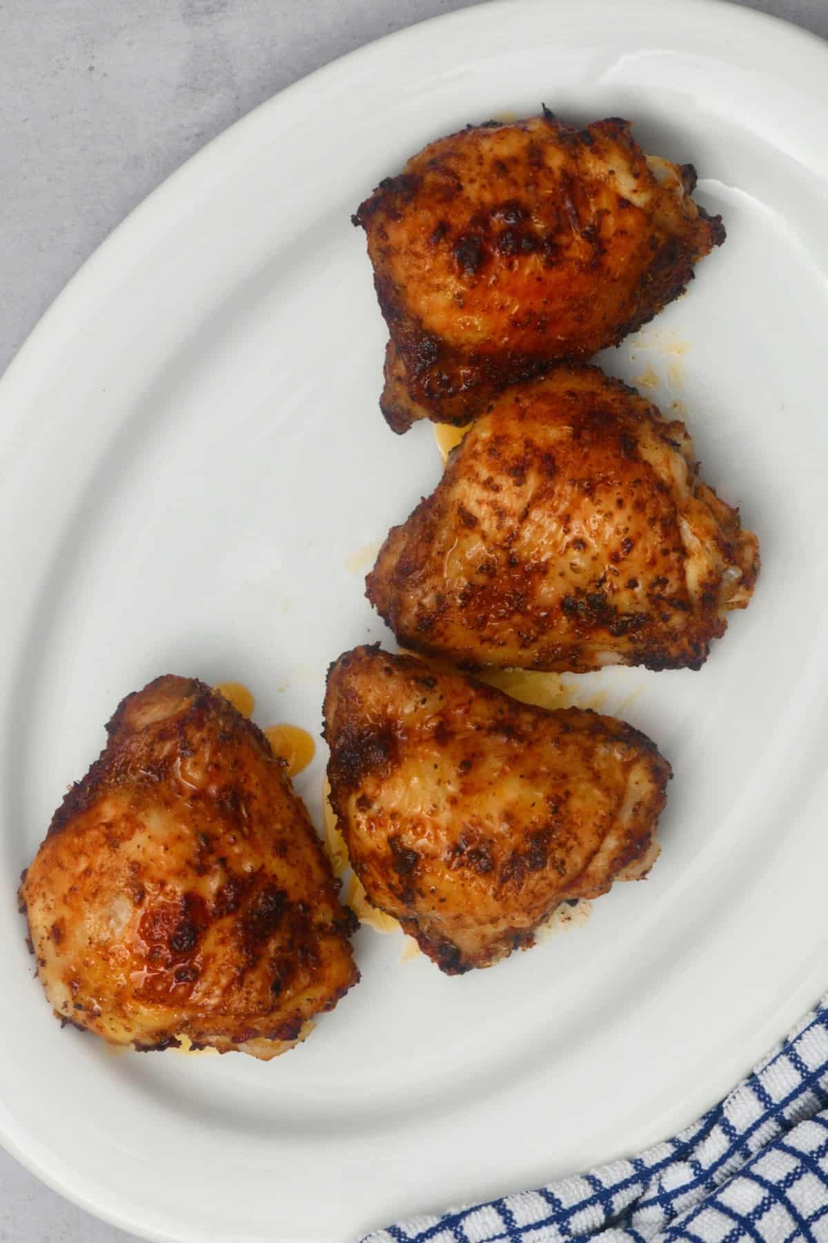 Four air fried chicken thighs
