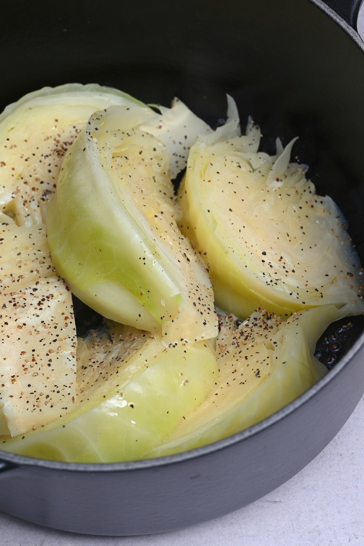 Cabbage topped with pepper in a pot