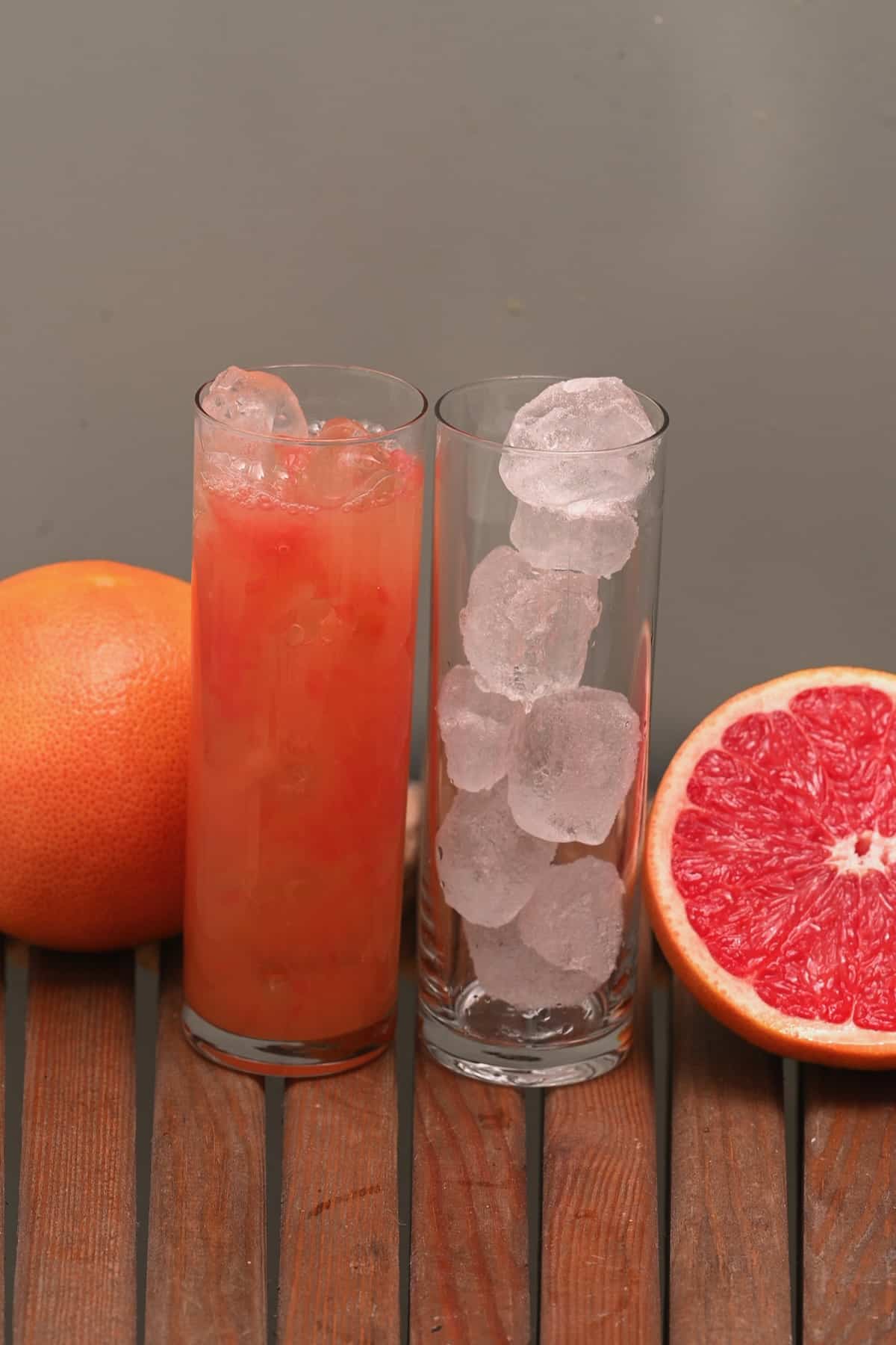 A glass filled with citrus juice