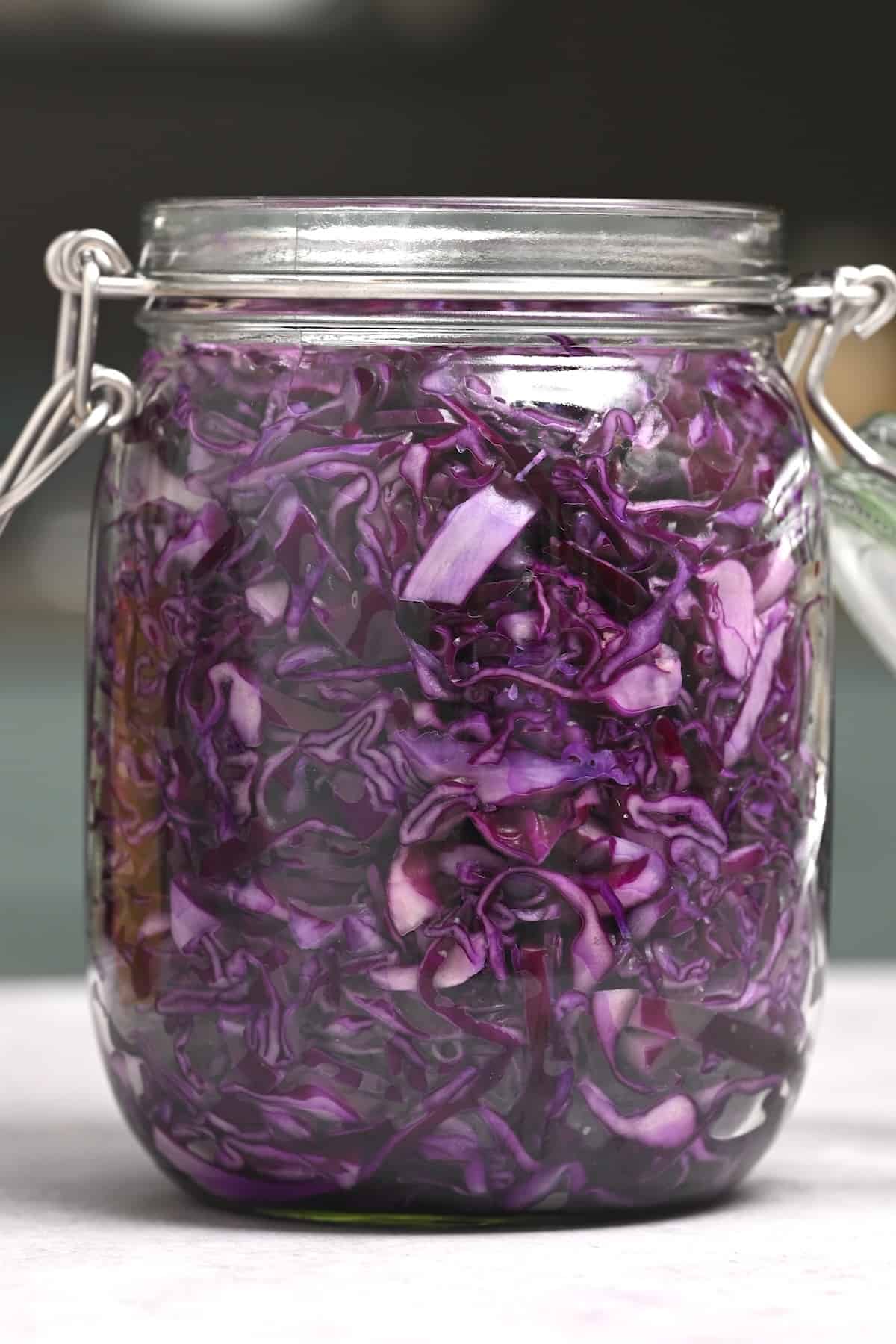 Shredded red cabbage in a jar