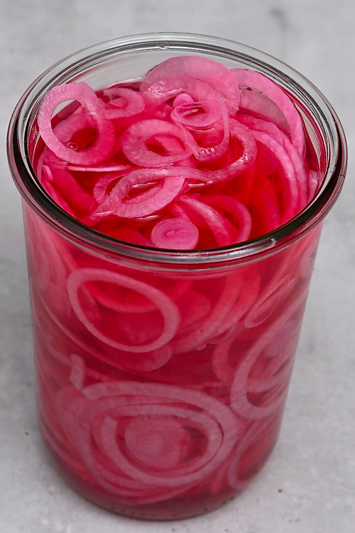A jar with Homemade pickled red onions