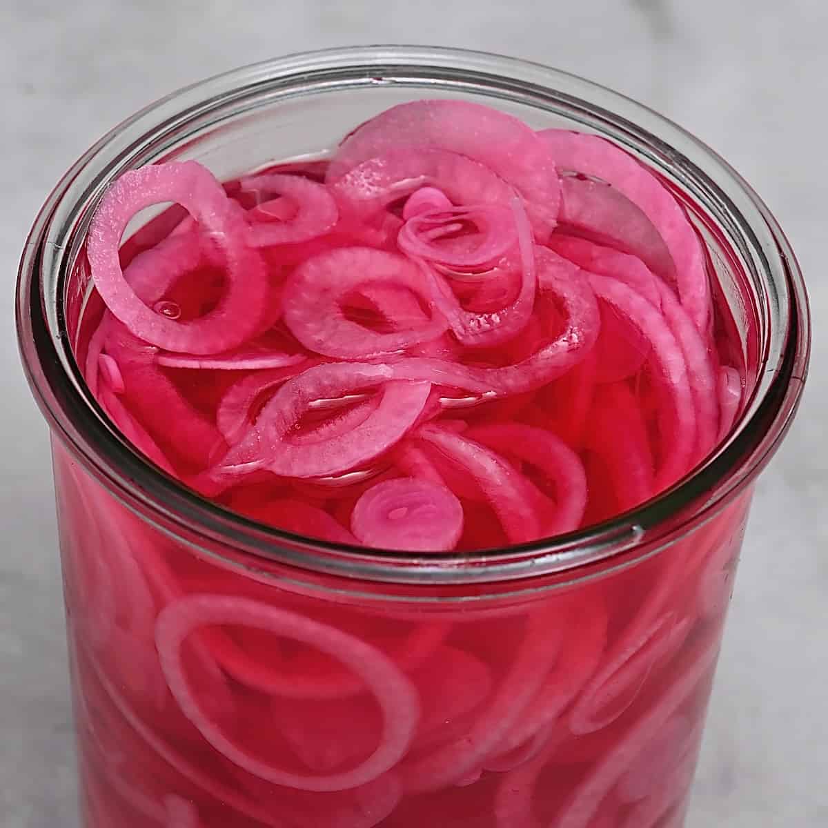A jar with Homemade pickled red onions