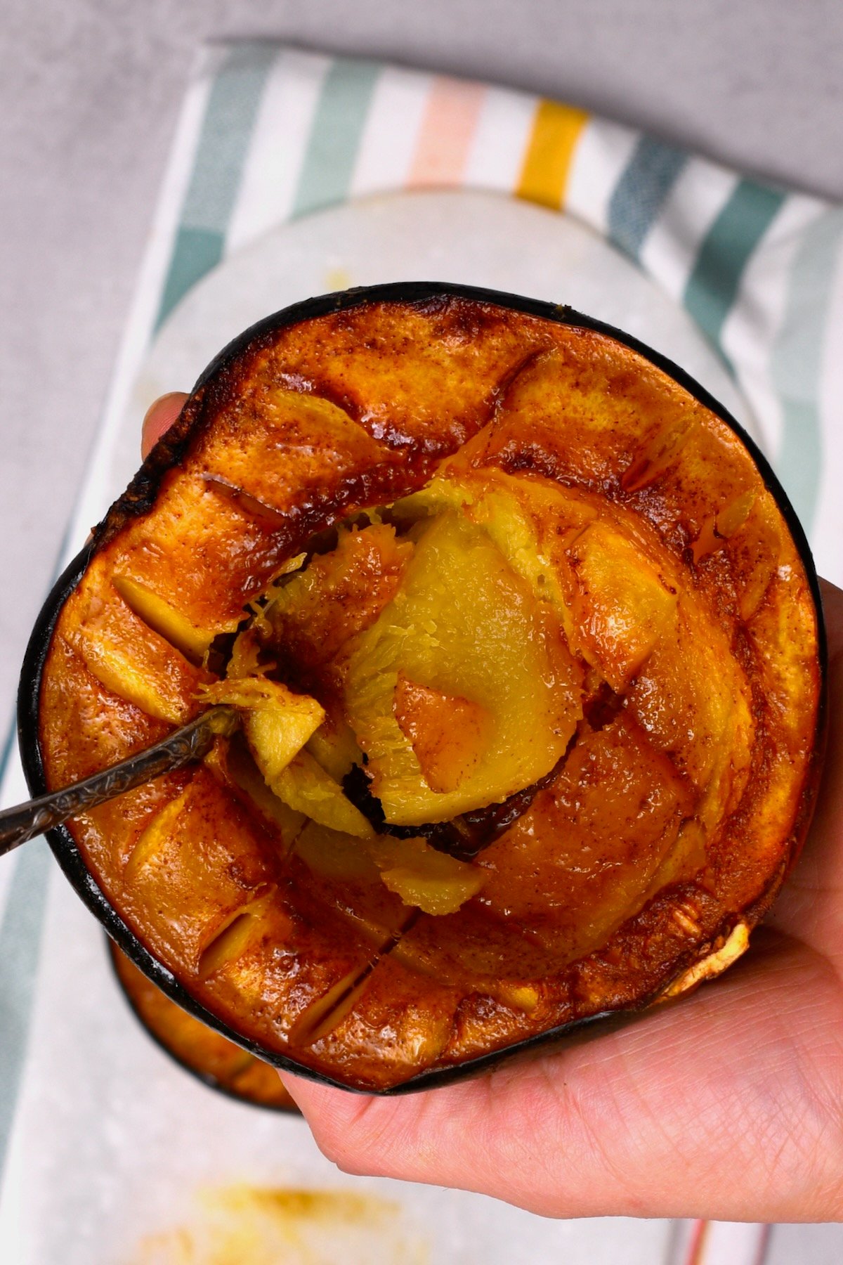 Roasted acorn squash and a spoon