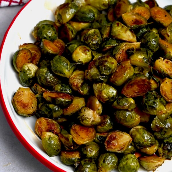 A large bowl with roasted Brussel sprouts