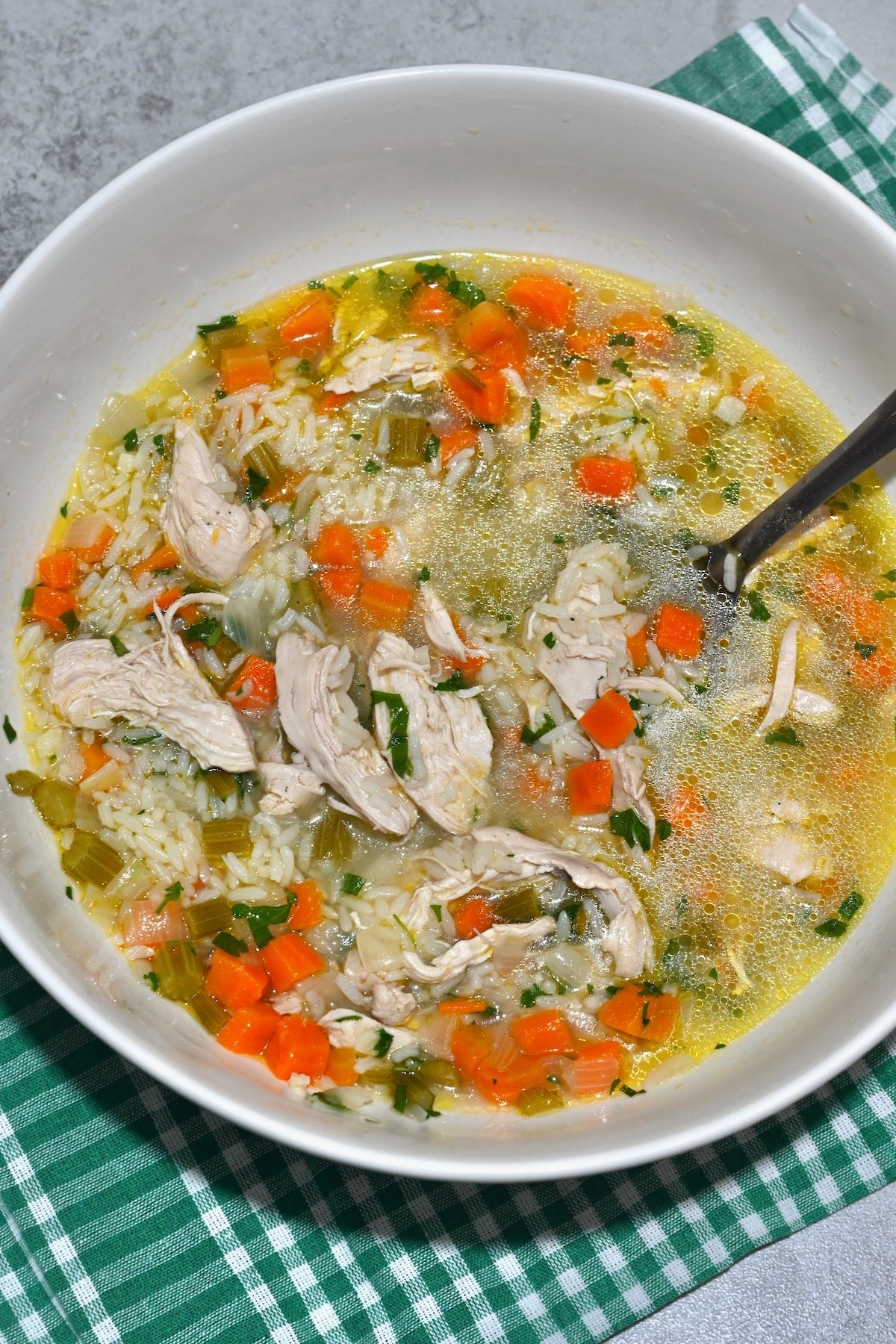 A serving of chicken and rice soup