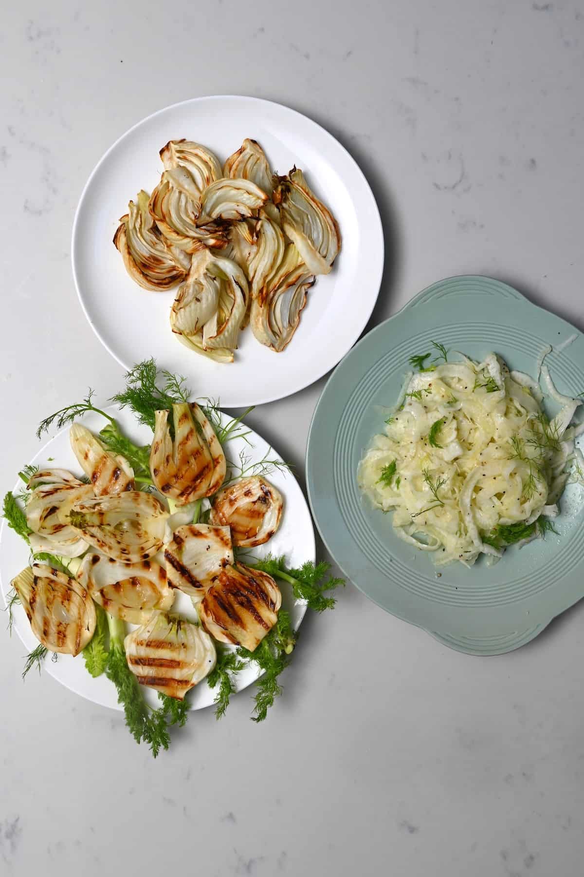 Fennel cooked in three methods - roasted, grilled and in a raw salad