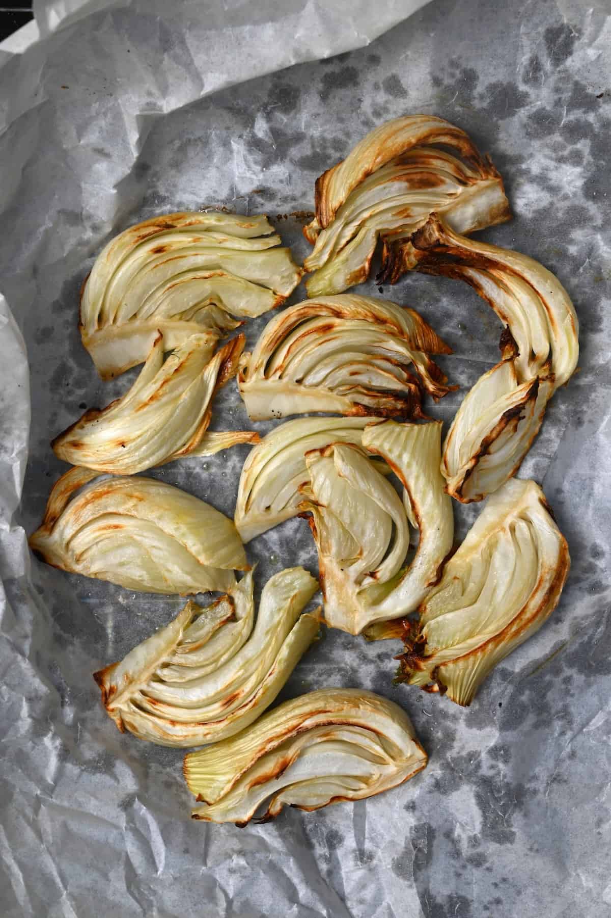 Roasted fennel on a baking tray